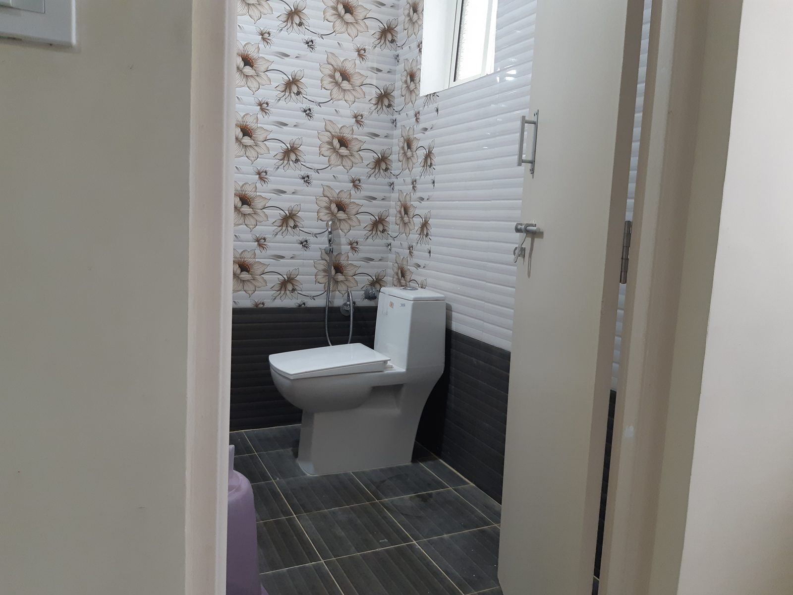 Shower and hot water tap in a private bathroom